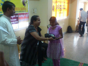 sakshama-visually-impaired-girl-receiving-audio-book-reader-and-recorder-device